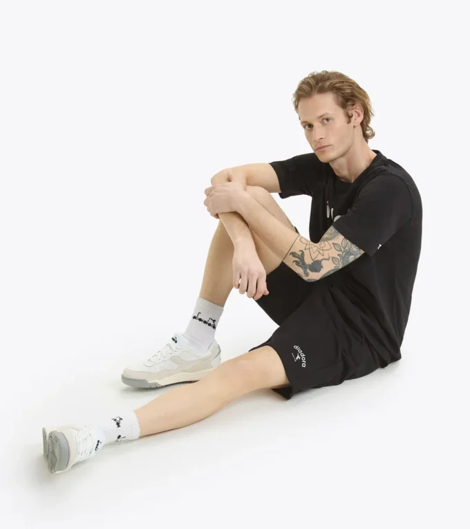 Bermuda Athl. Logo Bermudashorts aus French Terry-Baumwolle – geschlechtsneutral